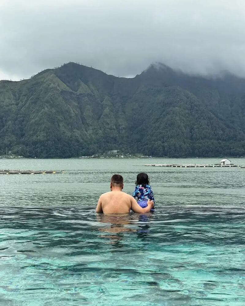 Family enjoying calm water on a Bali trip