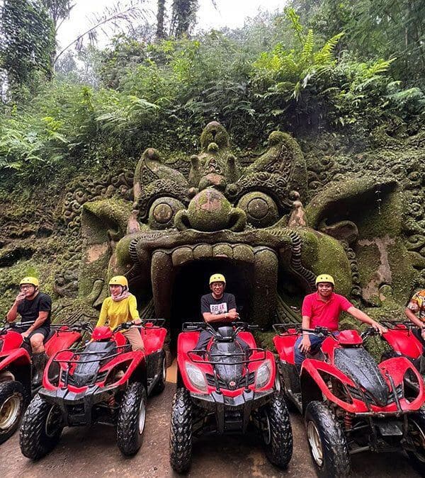 Travellers on an ATV experience in the Bali jungle